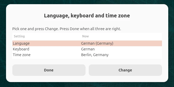 A small window titled Language, keyboard and time zone. It lists Language: German (Germany), Keyboard: German, Time zone: Berlin, Germany, with Done and Change buttons.