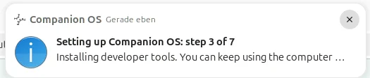 A desktop notification from Companion OS titled Setting up Companion OS: step 3 of 7, with the text Installing developer tools. You can keep using the computer.